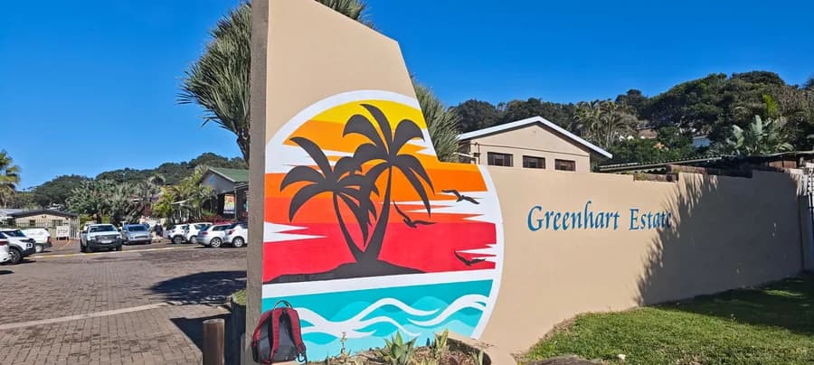 The GreenHart Estate entrance sign at the gate