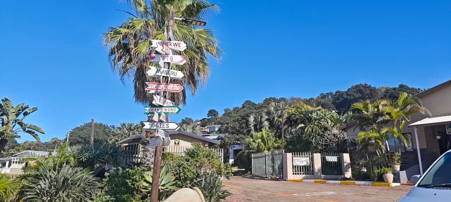 Signpost and gated entrance inside the estate