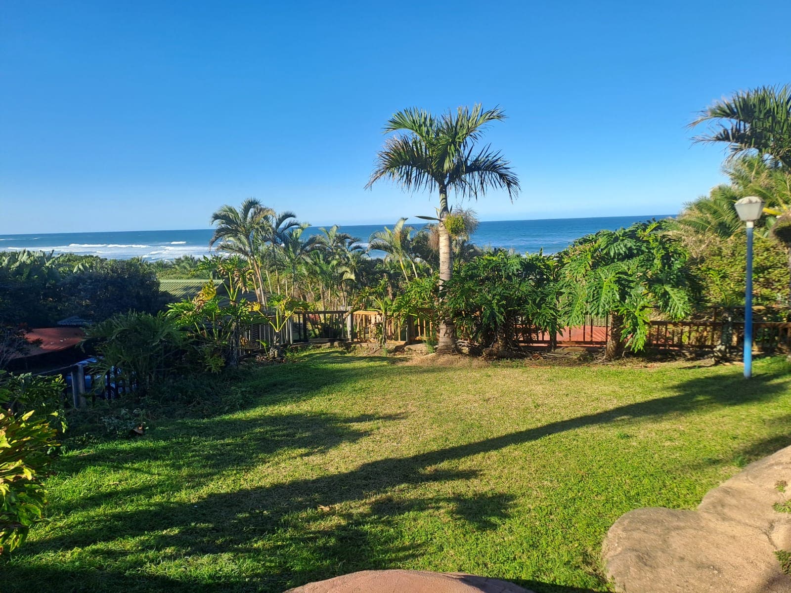Lawns rolling towards the water