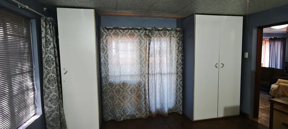 Bedroom with built-in wardrobes